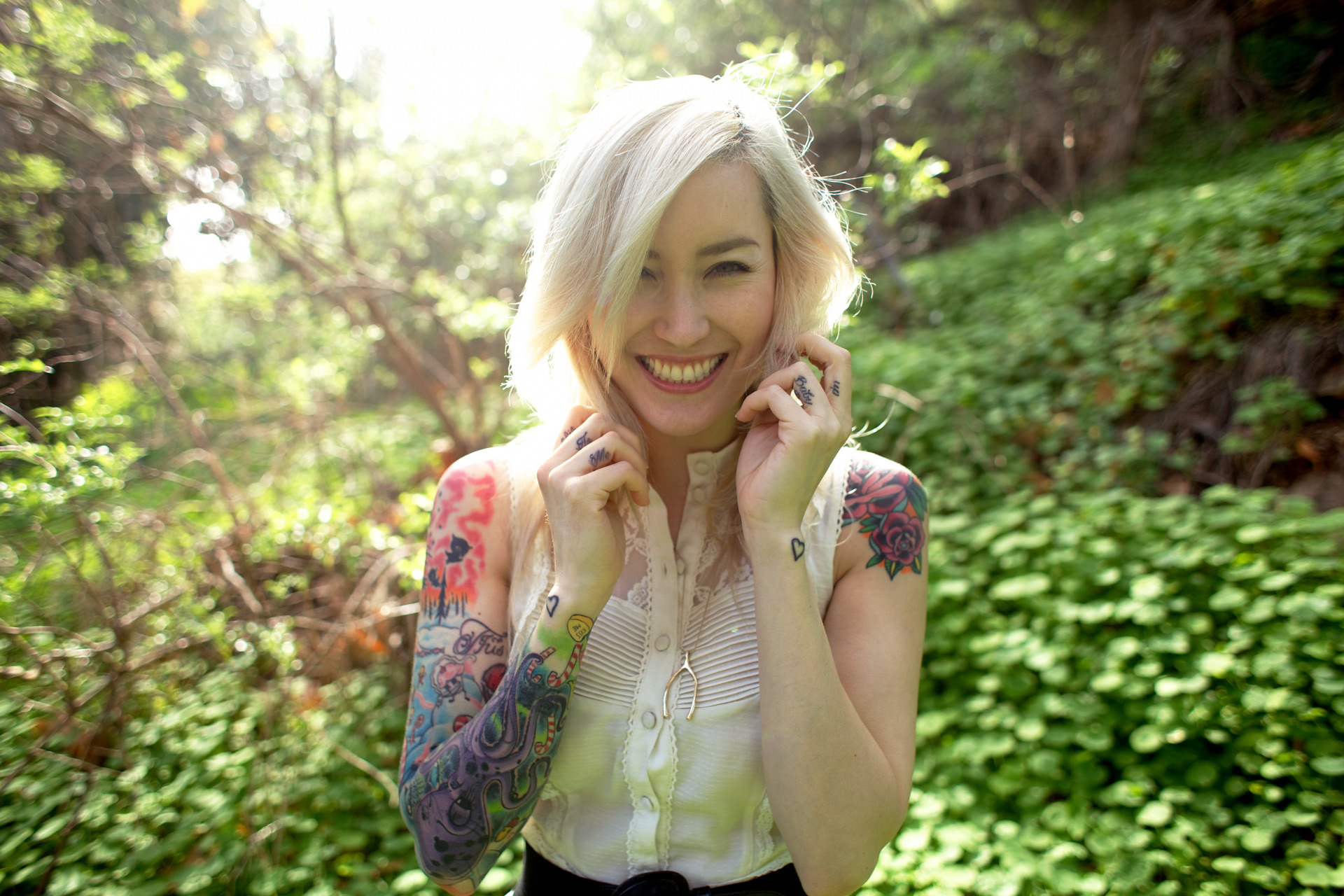 looking-at-viewer. blonde. white-hair. white-tops. tattoo-sleeve. women. br...